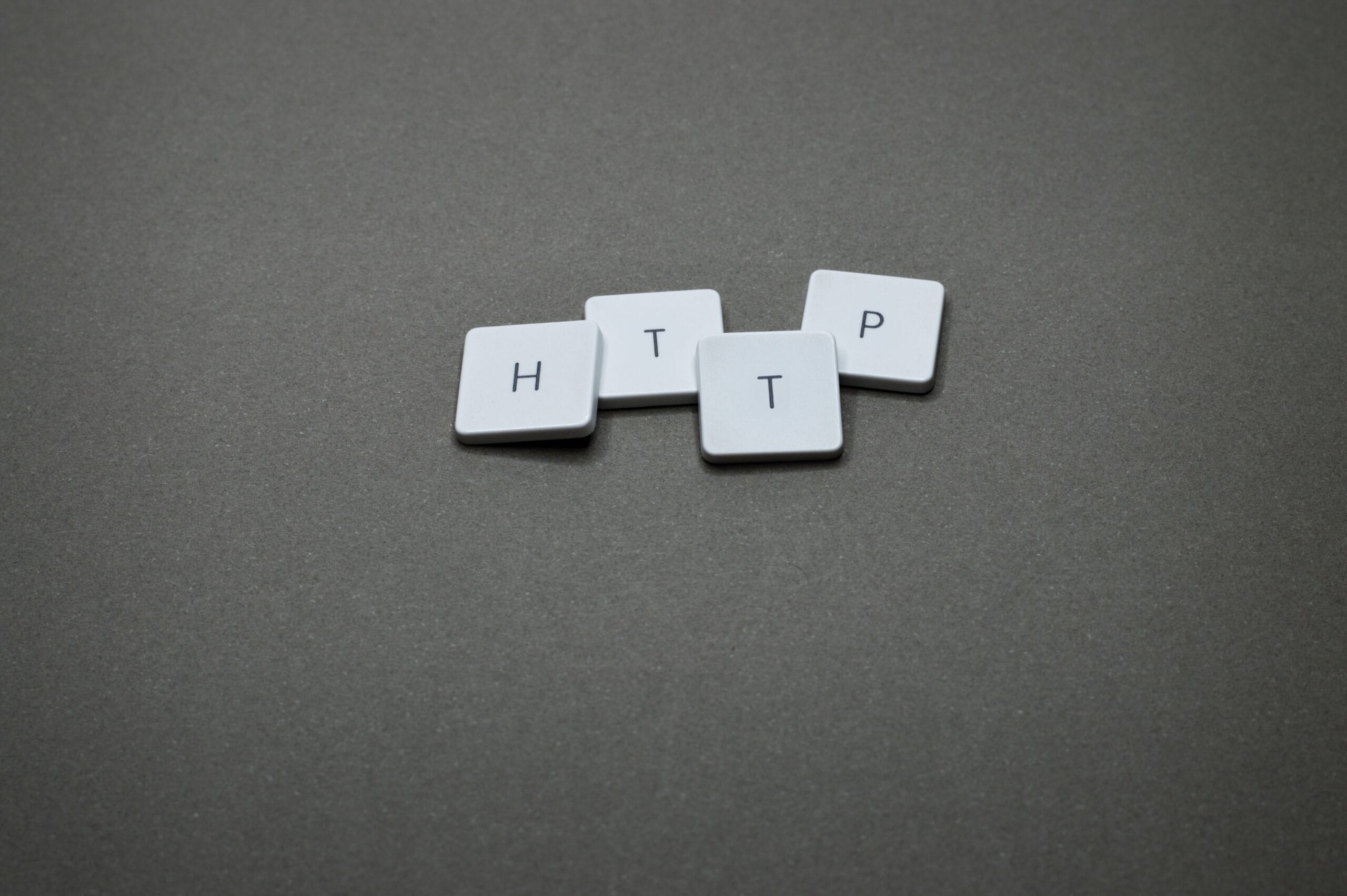 Keyboard tiles spelling HTTP representing Python urllib.request requests