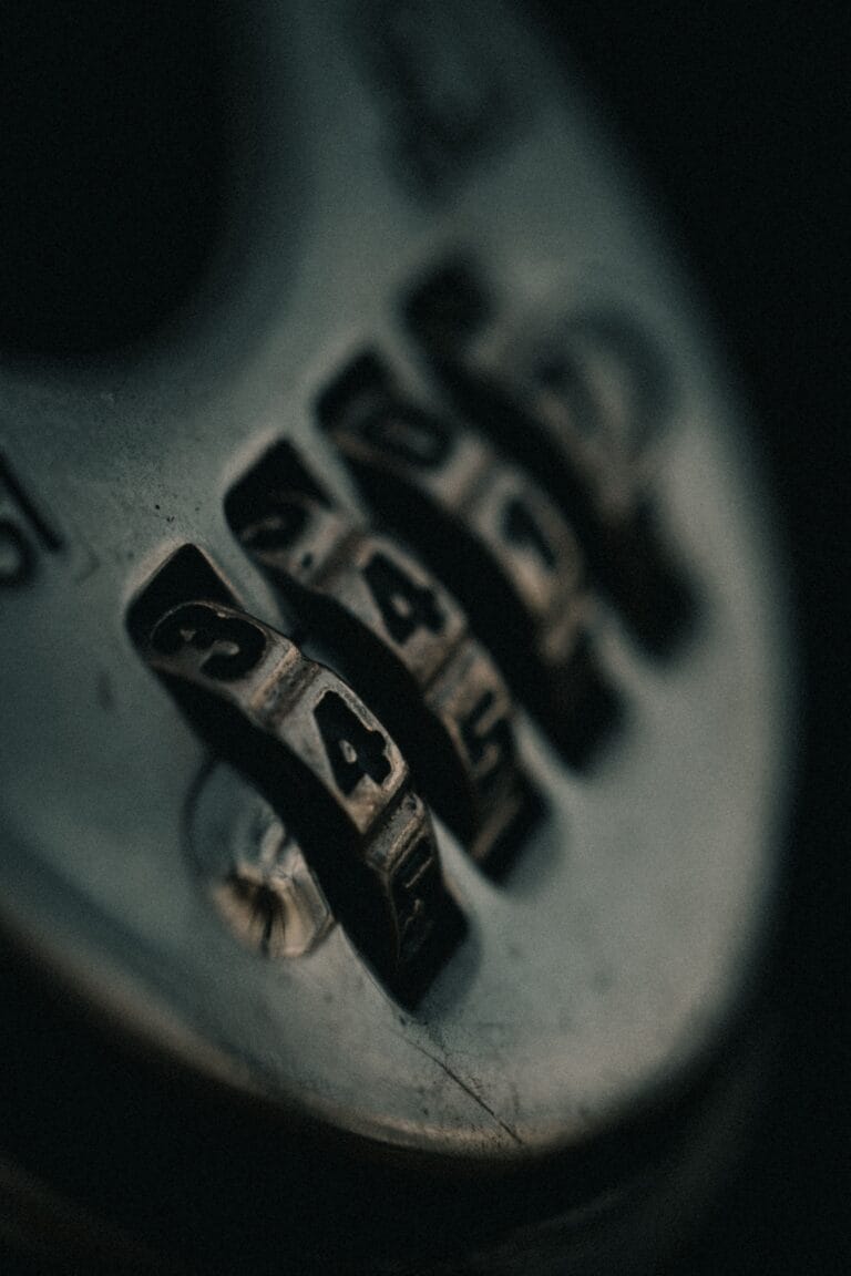 Detailed close-up of a combination lock with numbers in focus, highlighting security and privacy.