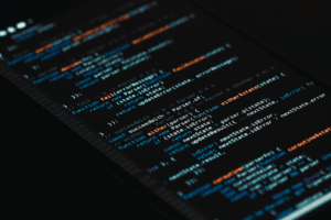 A detailed view of computer programming code on a screen, showcasing software development.